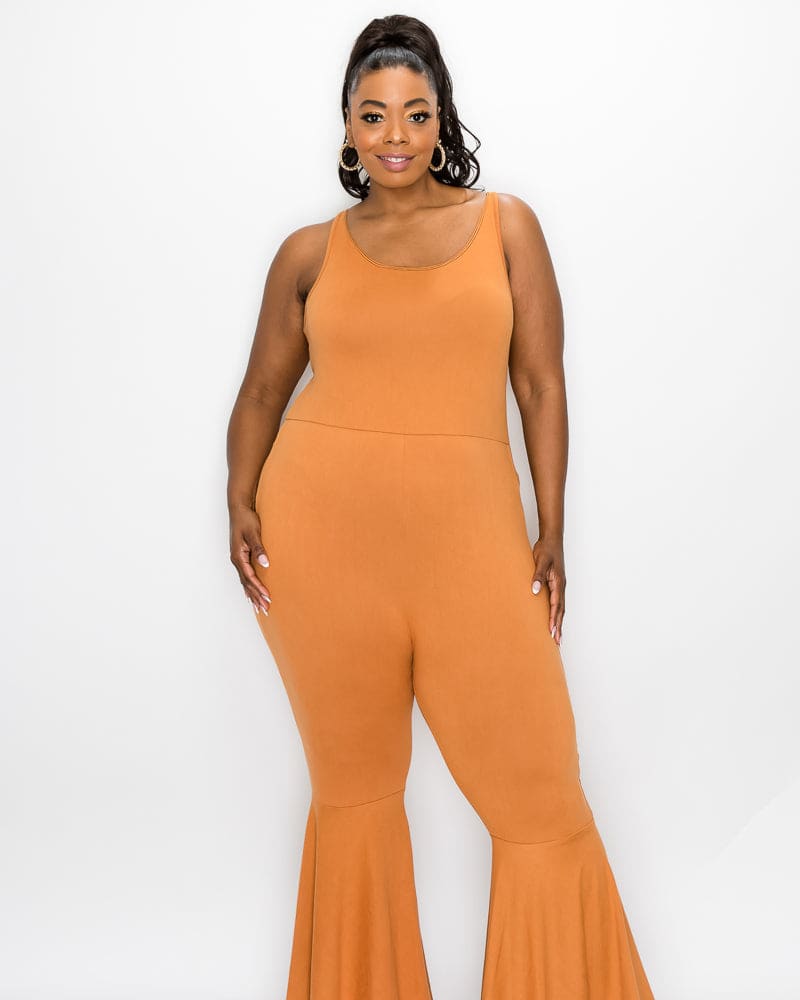Front of a model wearing a plus size Josie Flared Leg Jumpsuit in Clay by L I V D. | dia_product_style_image_id:241044